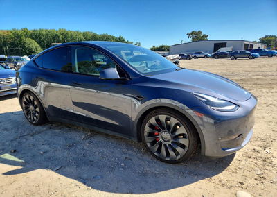 2022 Tesla Model Y, daño Lateral, Copart lote 71445456, foto 4 de 13