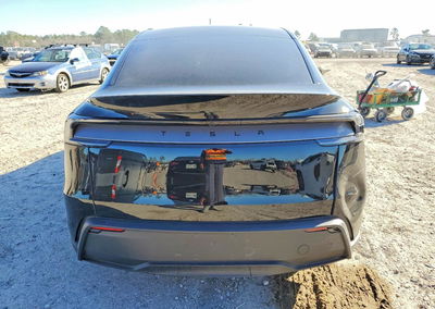 2026 Tesla Model Y, daño Lateral, Copart lote 73388515, foto 6 de 12