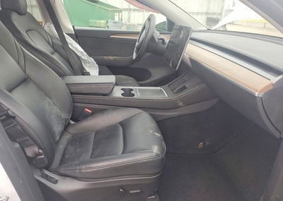 2023 Tesla Model Y, daño Lateral, Copart lote 70897166, foto 7 de 12