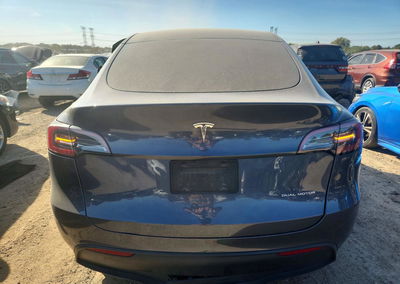2023 Tesla Model Y, daño Lateral, Copart lote 71864016, foto 6 de 14