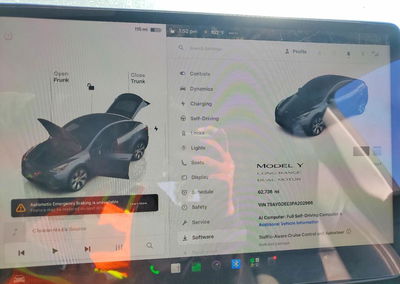 2023 Tesla Model Y, daño Trasero, Copart lote 71403836, foto 9 de 12