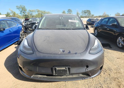 2023 Tesla Model Y, daño Lateral, Copart lote 71864016, foto 5 de 14