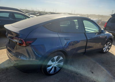 2023 Tesla Model Y, daño Lateral, Copart lote 71864016, foto 3 de 14