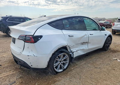 2023 Tesla Model Y, daño Lateral, Copart lote 67733726, foto 3 de 14