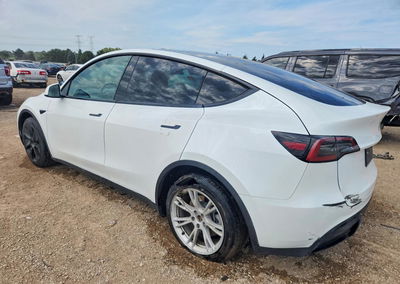 2023 Tesla Model Y, daño Lateral, Copart lote 67733726, foto 2 de 14