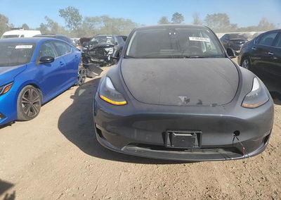 2023 Tesla Model Y, daño Lateral, Copart lote 71864016, foto 13 de 14