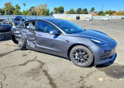 2023 Tesla Model 3, daño Lateral, Copart lote 70384086, foto 4 de 12
