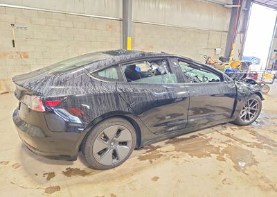 2023 Tesla Model 3, daño Generalizado, Copart lote 67188826, foto 3 de 13