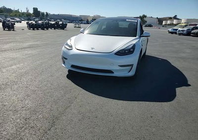 2023 Tesla Model 3, daño Lateral, Copart lote 72148156, foto 13 de 14
