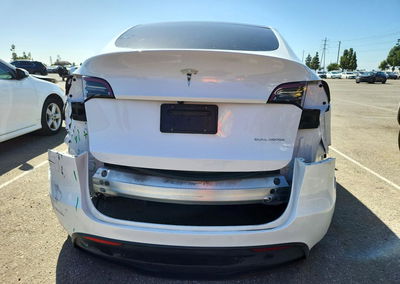 2023 Tesla Model Y, daño Bajos, Copart lote 72963916, foto 6 de 13
