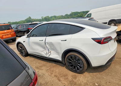 2023 Tesla Model Y, daño Lateral, Copart lote 60638606, foto 2 de 12