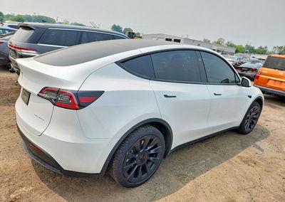 2023 Tesla Model Y, daño Lateral, Copart lote 60638606, foto 3 de 12