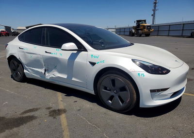 2023 Tesla Model 3, daño Lateral, Copart lote 60559756, foto 4 de 14