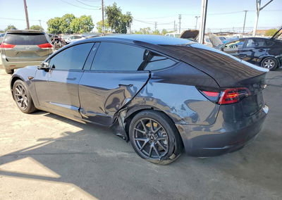 2022 Tesla Model 3, daño Lateral, Copart lote 68689496, foto 2 de 13