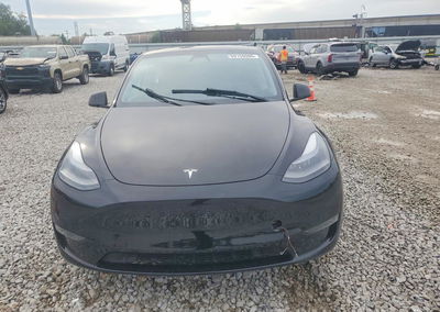 2023 Tesla Model Y, daño Lateral, Copart lote 69156996, foto 5 de 12