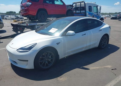 2021 Tesla Model 3 Standard Range Plus Rear-wheel Drive, Right Side damage, Iaai lot 46080255, photo 2 of 15