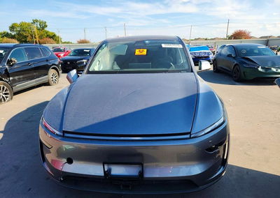 2026 Tesla Model Y, daño Lateral, Copart lote 69067876, foto 5 de 14