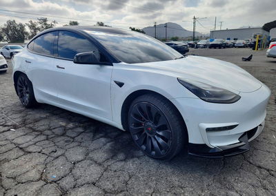 2022 Tesla Model 3, daño Lateral, Copart lote 68897126, foto 4 de 14