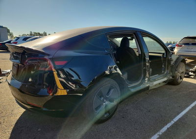 2023 Tesla Model 3, daño Lateral, Copart lote 68230216, foto 3 de 13