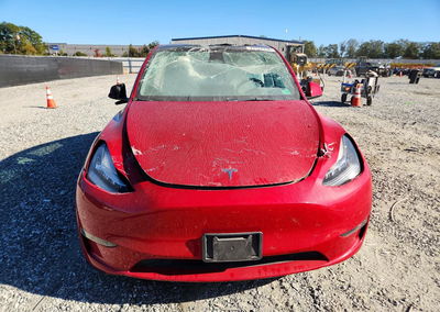 2023 Tesla Model Y, daño Lateral, Copart lote 73977316, foto 5 de 12
