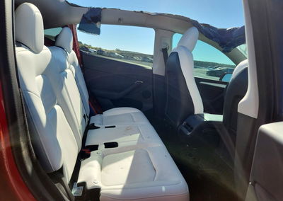 2023 Tesla Model Y, daño Lateral, Copart lote 73977316, foto 10 de 12