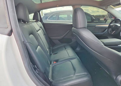 2024 Tesla Model Y, daño Trasero, Copart lote 71022186, foto 10 de 12