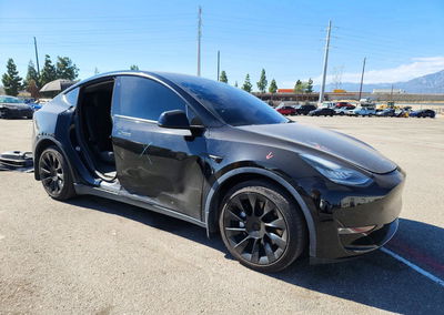 2022 Tesla Model Y, daño Lateral, Copart lote 71508376, foto 4 de 15