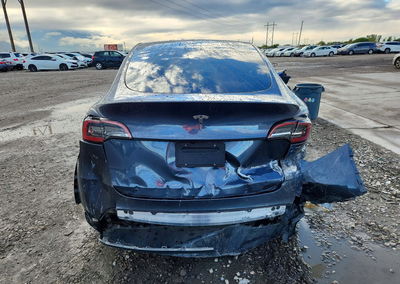 2023 Tesla Model Y, daño Trasero, Copart lote 72915936, foto 6 de 14