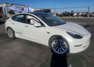 2023 Tesla Model 3, daño Lateral, Copart lote 73324536, foto 4 de 12