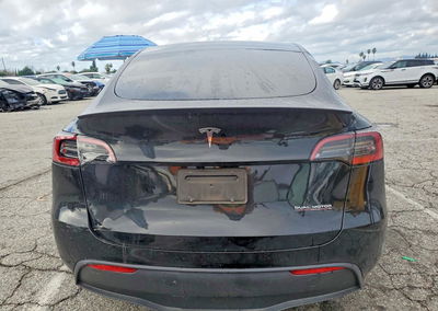 2025 Tesla Model Y, daño Frontal, Copart lote 98965205, foto 6 de 14