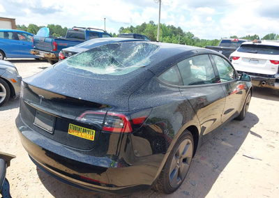 2023 Tesla Model 3 Rear-wheel Drive, Roof damage, Iaai lot 45452462, photo 4 of 15