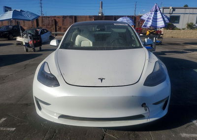 2023 Tesla Model 3, daño Lateral, Copart lote 73324536, foto 5 de 12