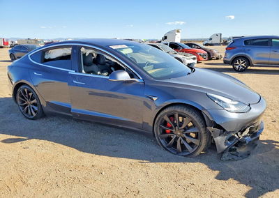 2020 Tesla Model 3, daño Lateral, Copart lote 70287316, foto 4 de 14