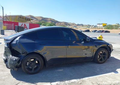 2026 Tesla Model Y Premium Rear-wheel Drive/rear-wheel Drive, daño Frontal, Iaai lote 46148064, foto 13 de 23