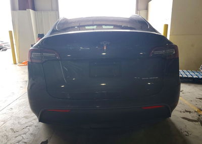 2021 Tesla Model Y, daño Lateral, Copart lote 74216436, foto 6 de 12