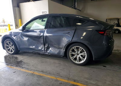 2021 Tesla Model Y, daño Lateral, Copart lote 74216436, foto 2 de 12