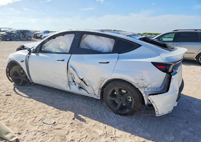 2026 Tesla Model Y, daño Ao, Copart lote 65918076, foto 2 de 13