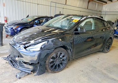 2023 Tesla Model Y, Rollover damage, Copart lot 68345536